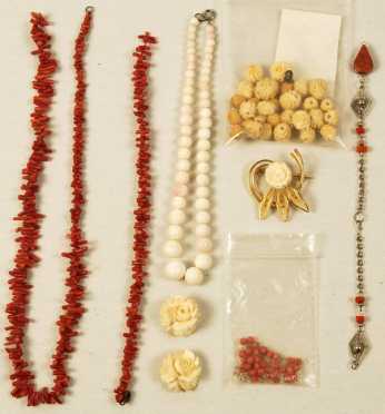 Ivory and Coral Necklaces and carved flowers