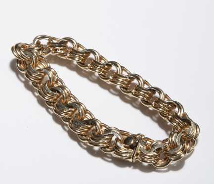 14k Yellow Gold Curb-Link Bracelet.