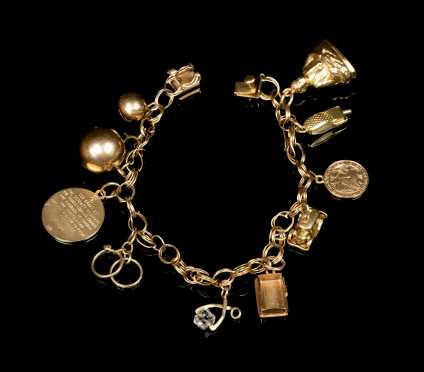 Yellow Gold Charm Bracelet with Ten Charms