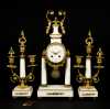 French Three Piece Marble and Gilt Bronze Clock Set